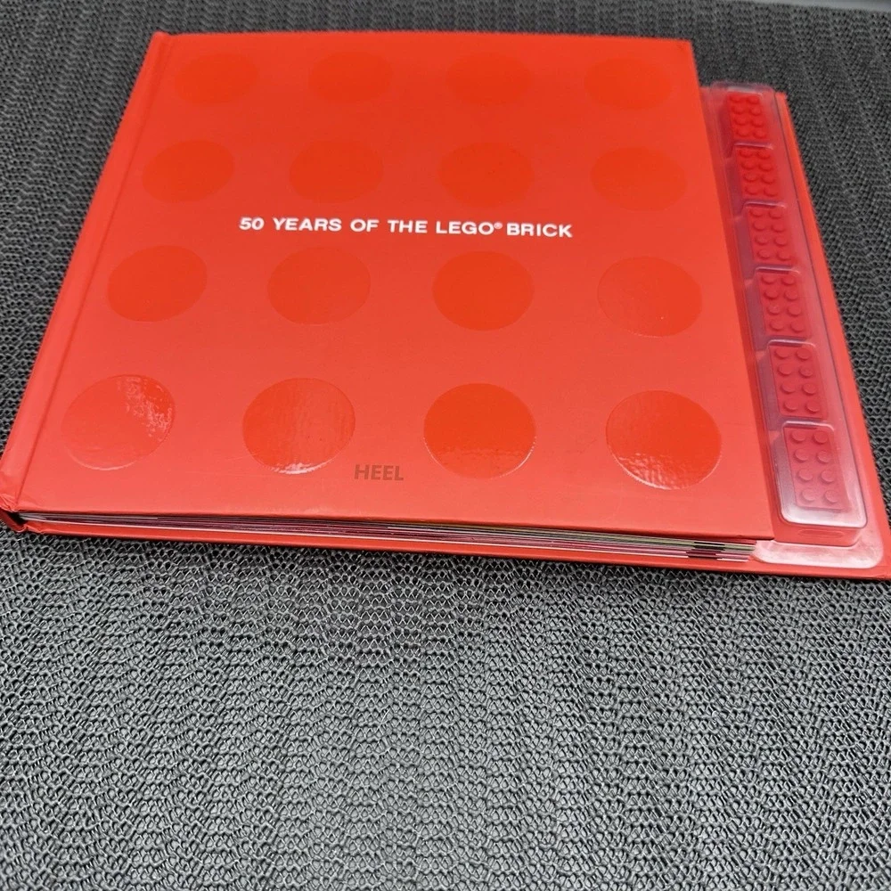 LEGO 50 Years of the LEGO Brick Hardcover Book w/ Commemorative LEGO Bricks 2008